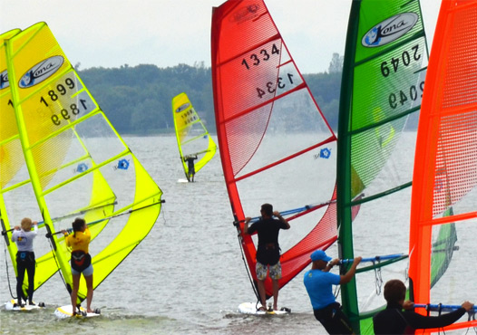 Wind surfers on lake