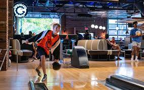 Kid bowling at the Garage in Waconia